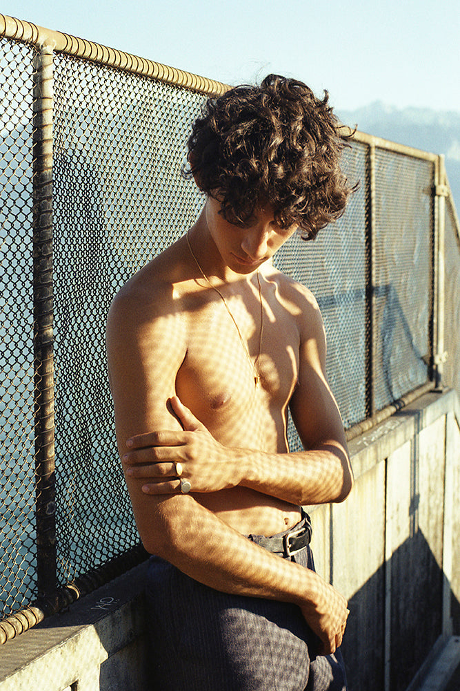 Ulysse wearing Violette Stehli signet rings. Photo by Angélique Stehli.