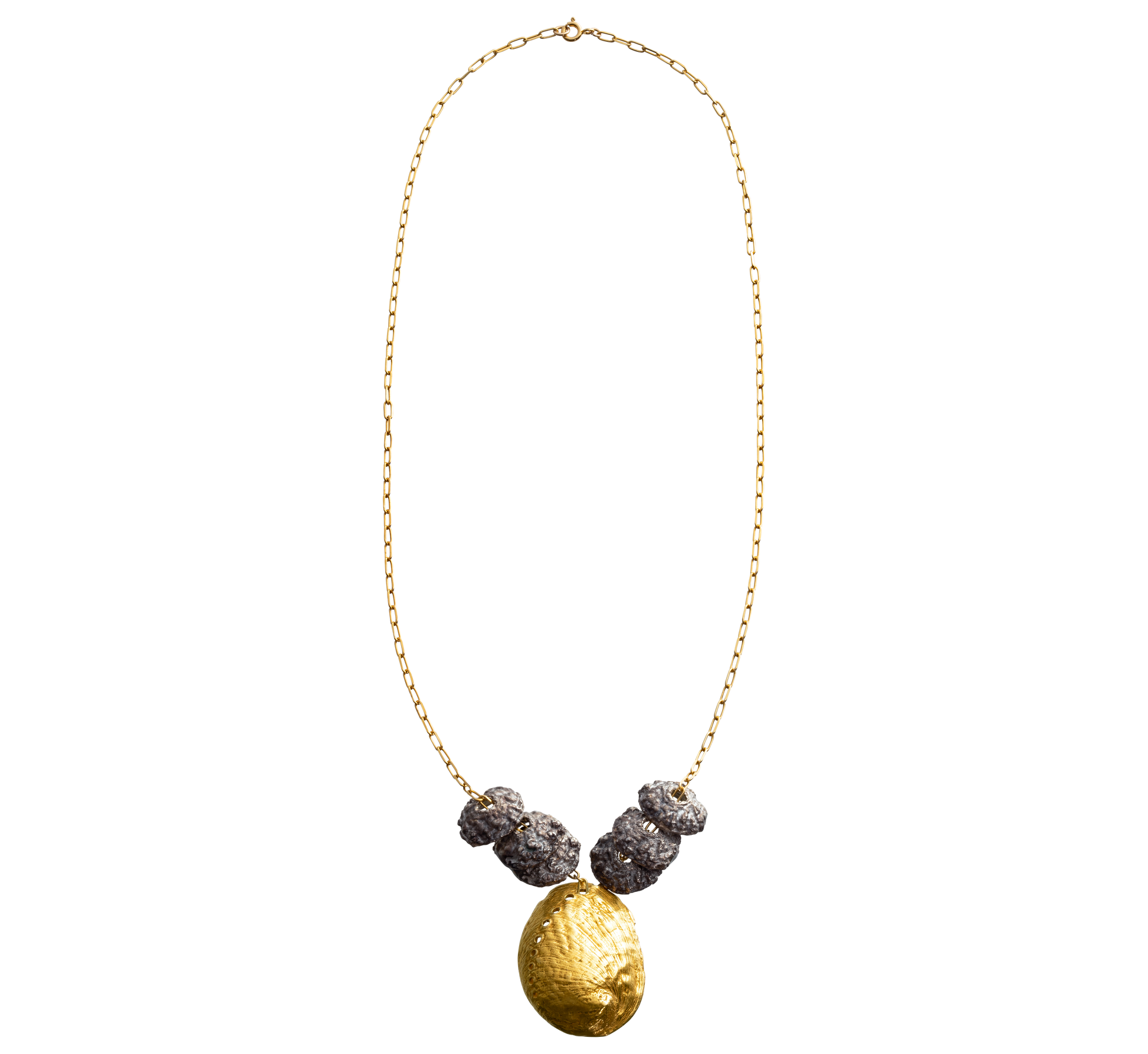A sterling silver and gold vermeil necklace made from casts of eucalyptus seed caps and an abalone shell. Made by Violette Stehli.