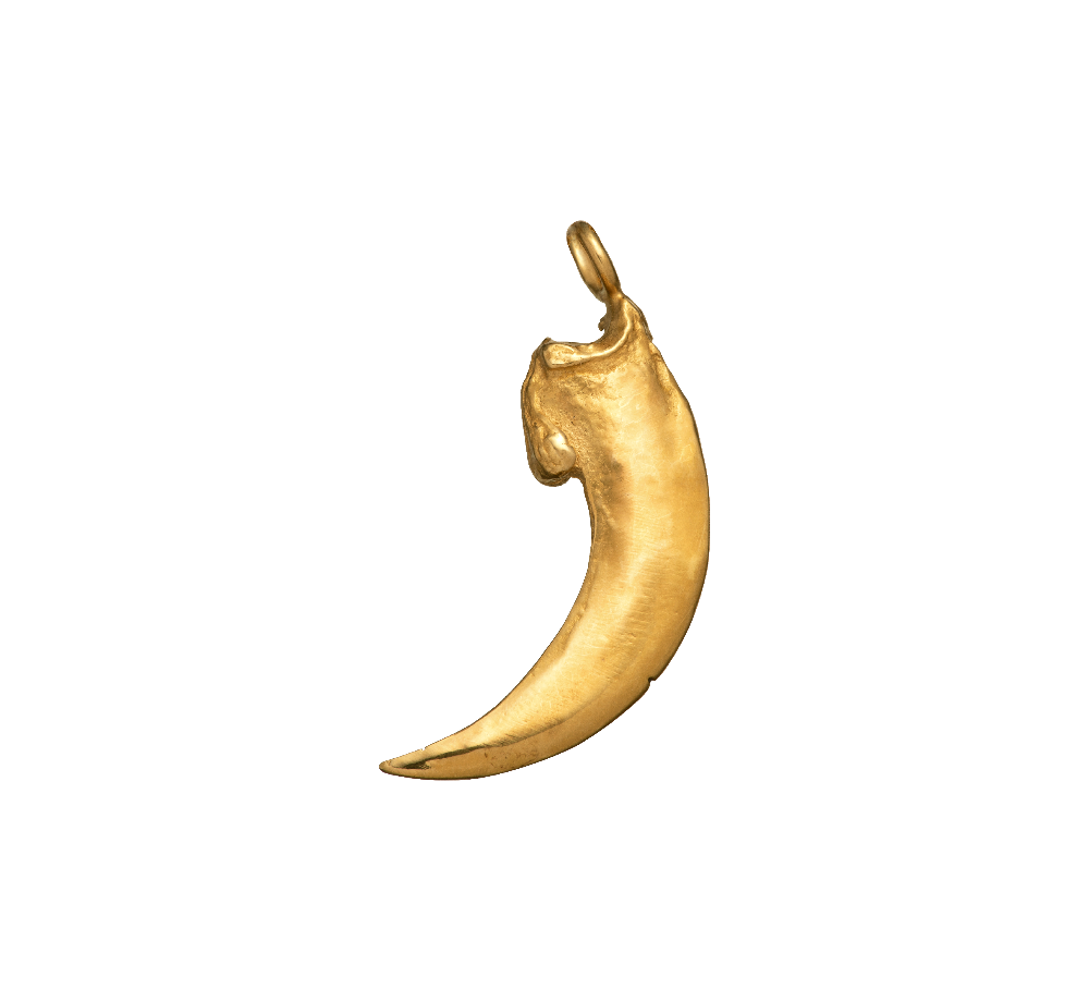 A close-up image of a bat claw charm. Made by Violette Stehli using the lost wax casting techique.