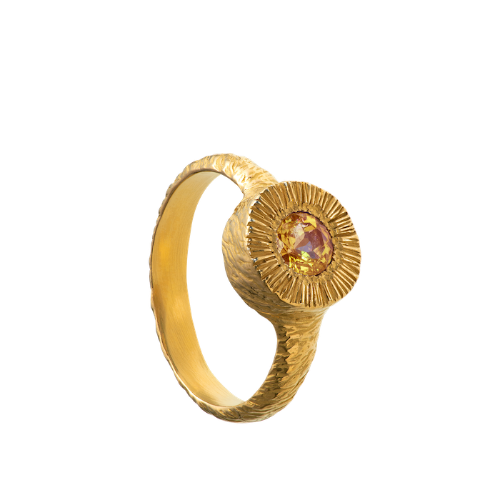 A hand sculpted, textured sterling silver ring set with a citrine. Made using the lost wax casting technique by Violette Stehli.