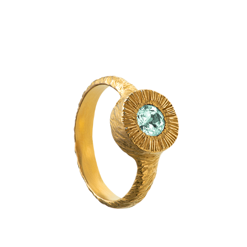 A hand sculpted, textured sterling silver ring set with a mint-green tourmaline. Made using the lost wax casting technique by Violette Stehli.