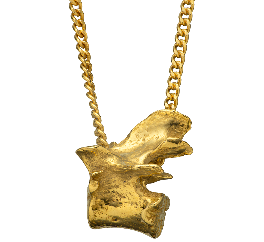 An 18-karat gold vertebra pendant charm on a curb-link chain. by Violette Stehli.