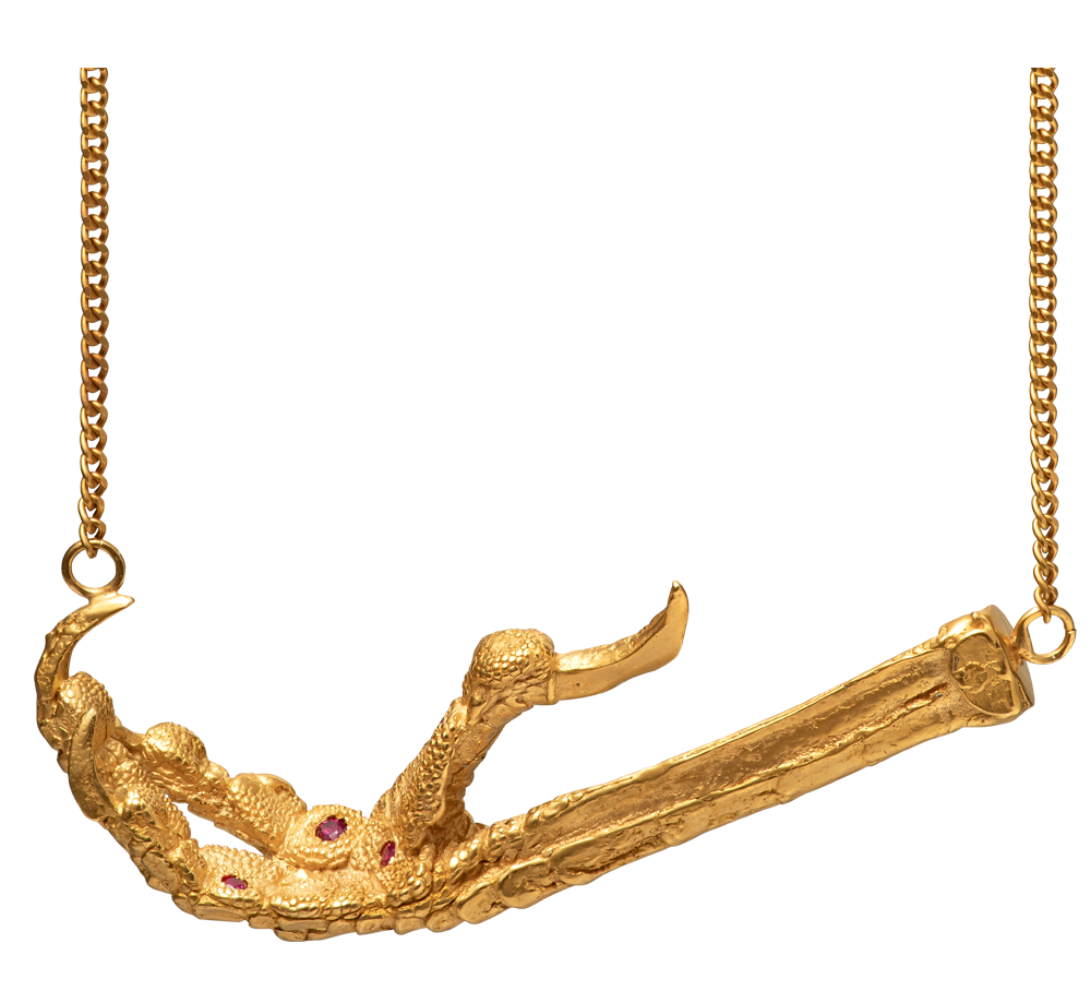 A necklace cast from a crows foot and set with rubies by Violette Stehli. The necklace is a choker on a curb-link chain.