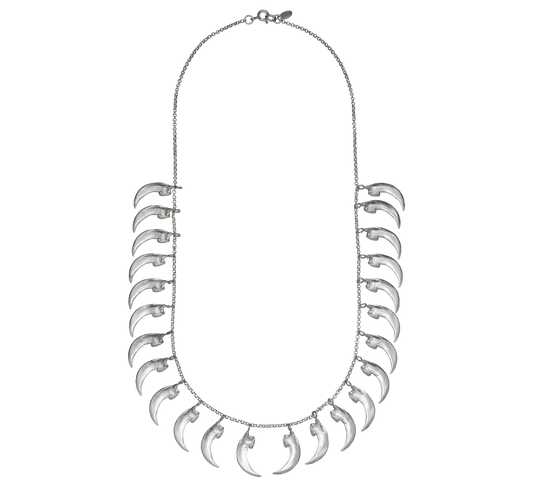 A sterling silver necklace made from cast replicas of bat claws. The claws hang from a rolo link chain. The necklace is tough but delicate, like armor. Handmade by Violette Stehli