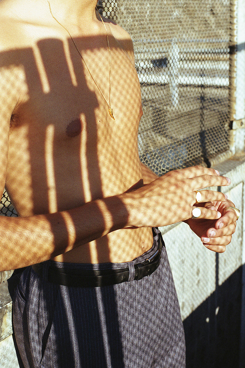 Ulysse wearing Violette Stehli signet rings. Photo by Angélique Stehli.