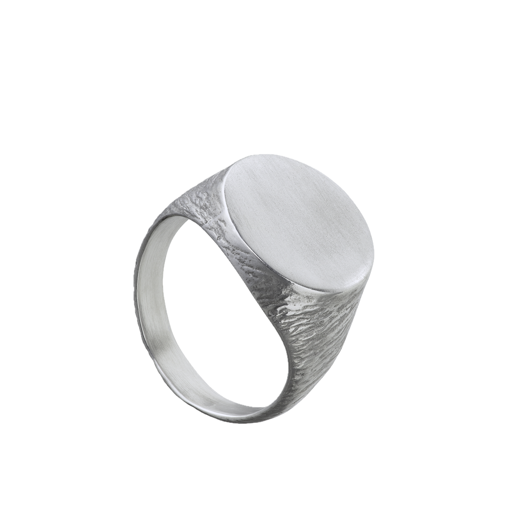 a delicate yet tough, handmade unisex ring for everyday wear made from Responsible Jewelry Council certified sterling silver. The band is textured and the surface is round and smooth.