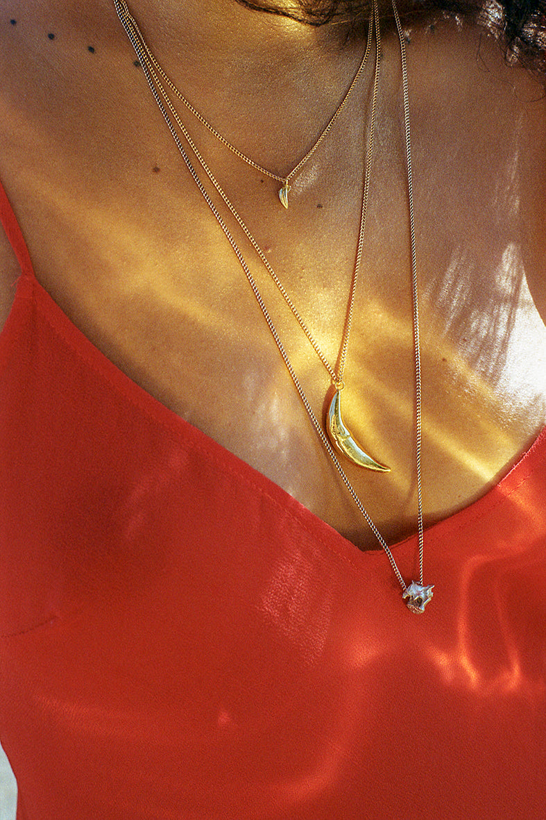 A photo of assorted Violette Stehli pendants. Photo by Anngélique Stehli.