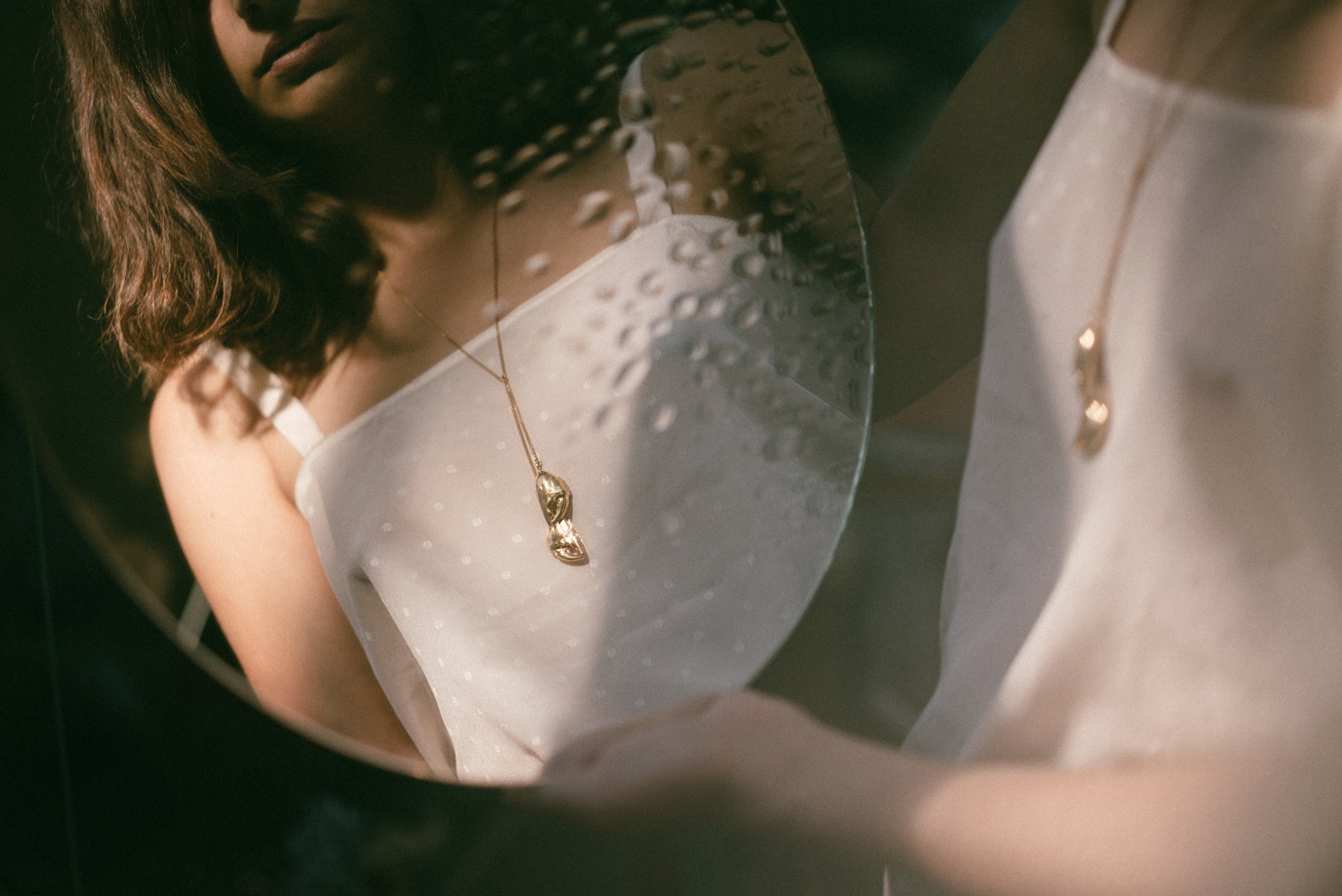 A photo of the Violette Stehli gold vermeil Crab Claw lariat necklace by Violette Stehli. Photo by Cécile Chabert.