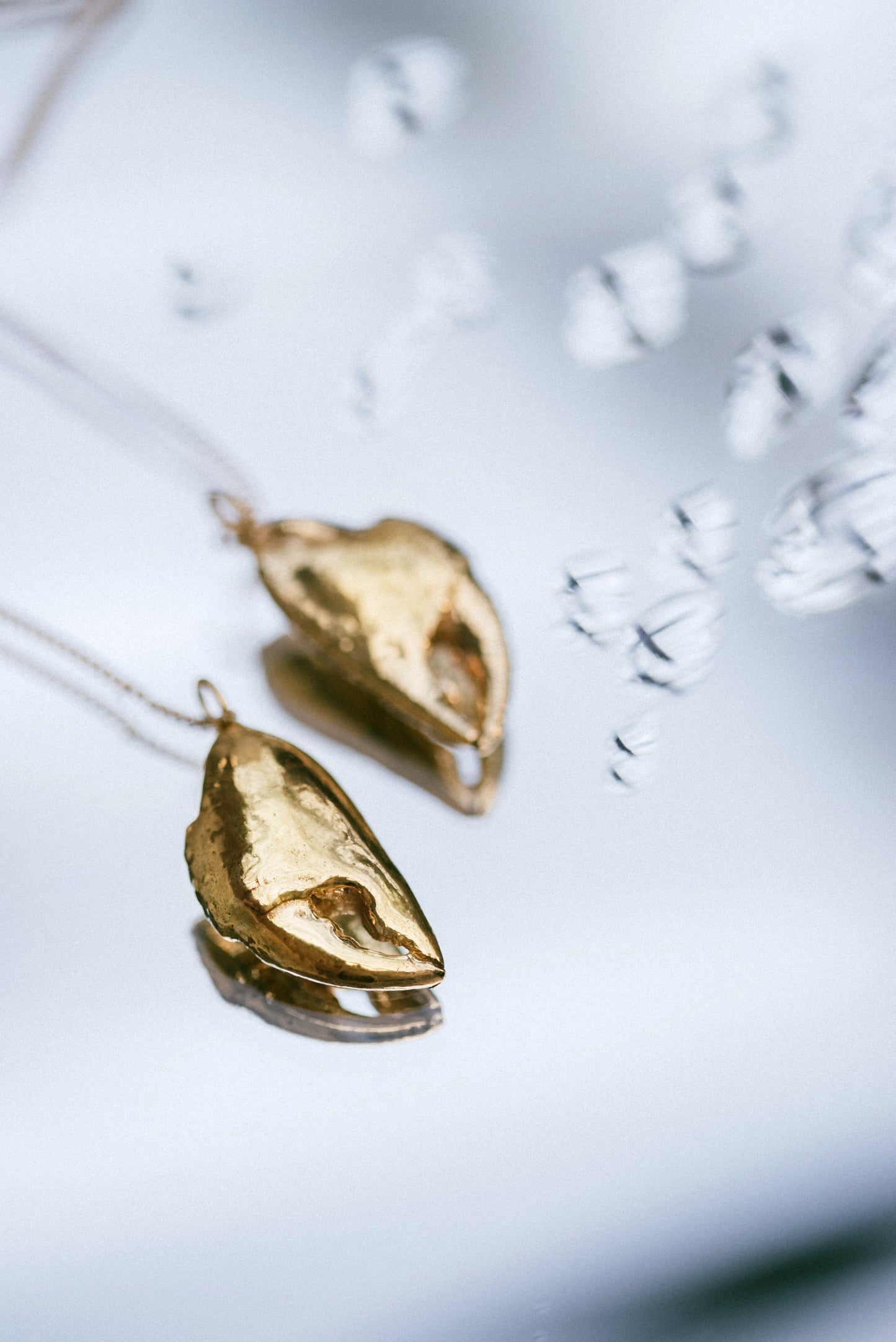 A photo of the Violette Stehli gold vermeil Crab Claw lariat necklace by Violette Stehli. Photo by Cécile Chabert.