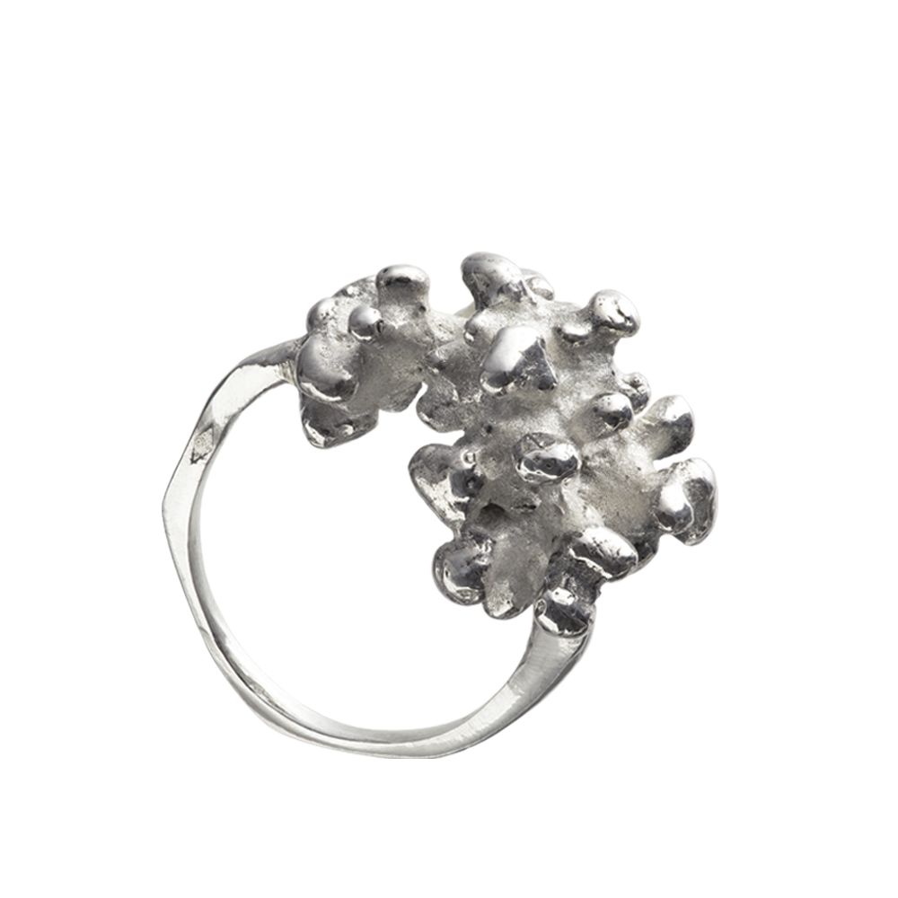 A sterling silver Responsible Jewellery Council certified gold coral ring. Handmade using the lost-wax casting technique. The piece of coral has been reproduced in silver.