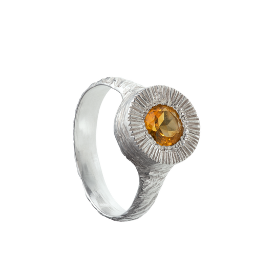 A hand sculpted, textured sterling silver ring set with a citrine. Made using the lost wax casting technique by Violette Stehli.