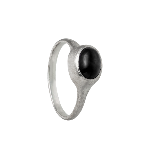 A delicate and textured sterling silver band set with an onyx cabochon. Hand sculpted by Violette Stehli