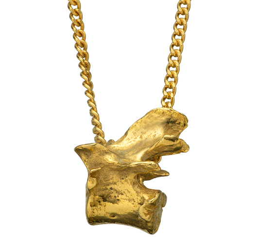 An 18-karat gold vertebra pendant charm on a curb-link chain. by Violette Stehli.