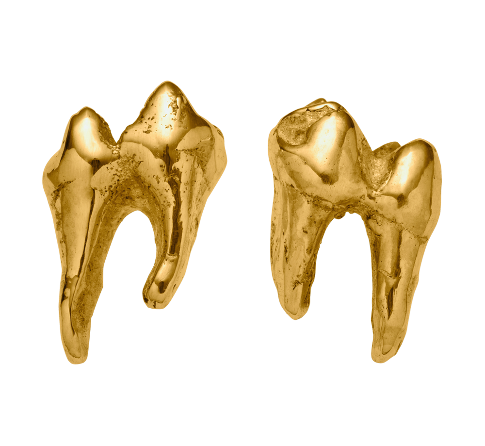 A delicate pair or 18-karat gold studs cast from possum teeth.